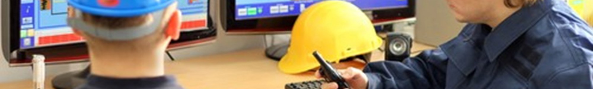 Two Workers In The Control Room Shutterstock 69735130 500